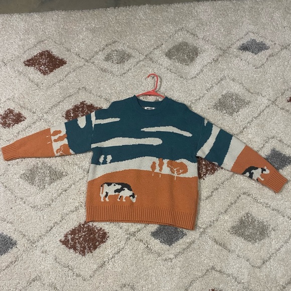 Aelfric Eden Orange and Teal Cow Sweater - Picture 1 of 3